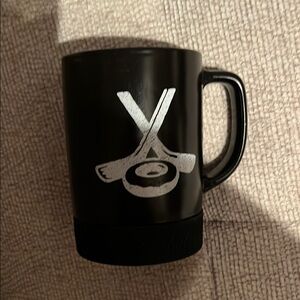 Tim Hortons Black Mug with White Logo withh hockey puck bottom